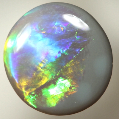 SOLID SEMI BLACK OPAL Flame pattern of orange, green and blue
